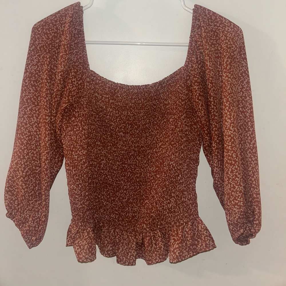 cute maroon top with white flower detailing !